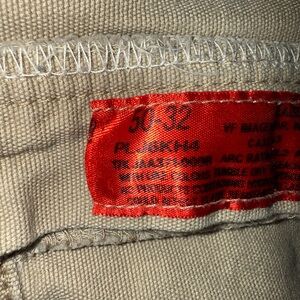Beige Pants with Red Tag